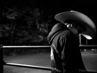 Derick Costa Jr., 10,  grabs some time alone just before his first bull ride at the final event in the New England Rodeo championship in Norton, MA.